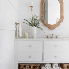 White Coastal Bathroom With Carved Mirror