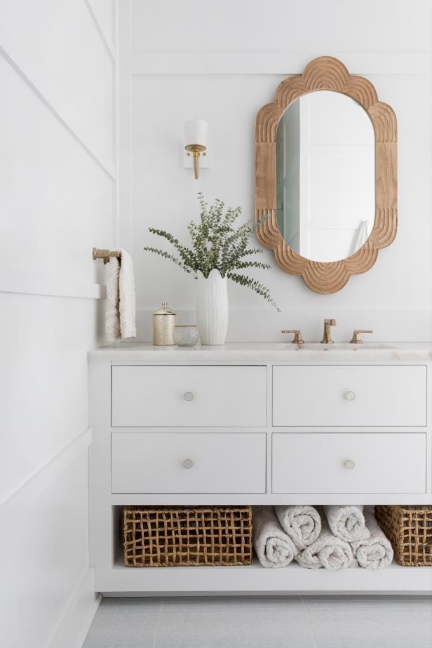 White Bathroom With Carved Mirror