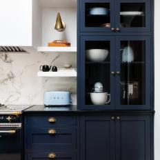 Navy Kitchen Cabinets and Blue Toaster