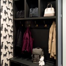 Contemporary Mudroom With Dog Silhouette Wallpaper and Black Bench 