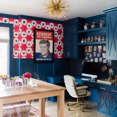 Eclectic Home Office and Craft Room With Teal Walls, Brass Starburst Chandelier and Graphic Wallpaper 