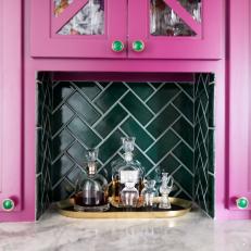 Contemporary Home Bar Nook With Magenta Cabinets and Chevron Tiles 