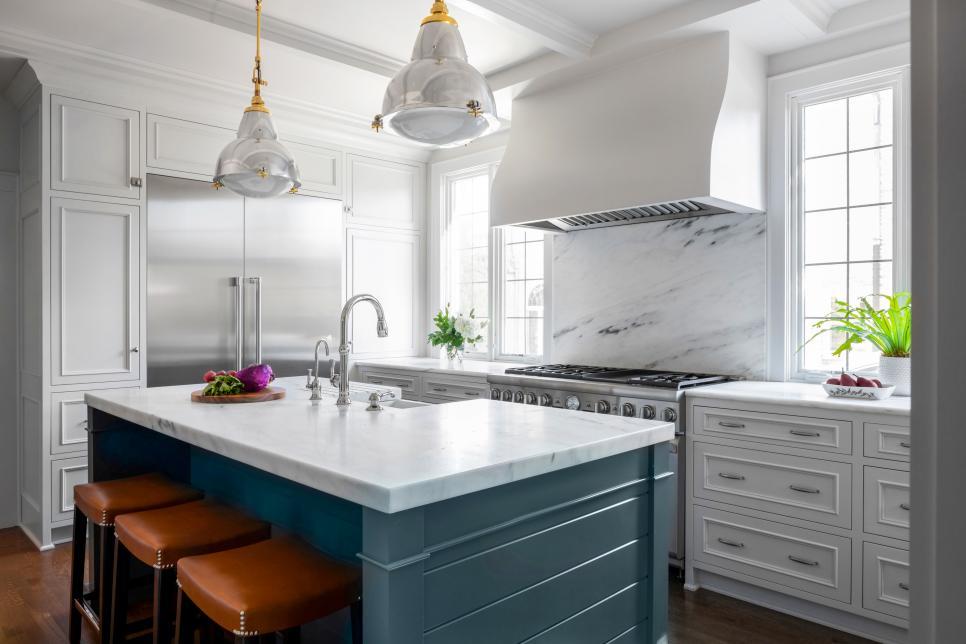 Kitchen With Blue Island and Leather Barstools