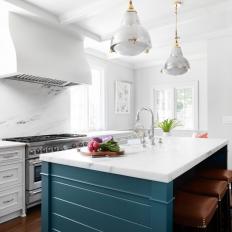 Traditional Kitchen Features a Large Island and Pendant Lights