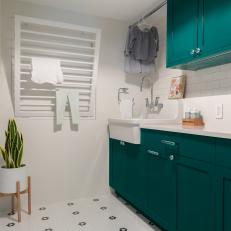 Contemporary Laundry Room With Aqua Cabinets