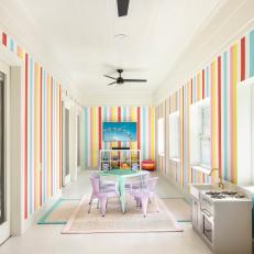 Multicolored Playroom With Striped Wallpaper
