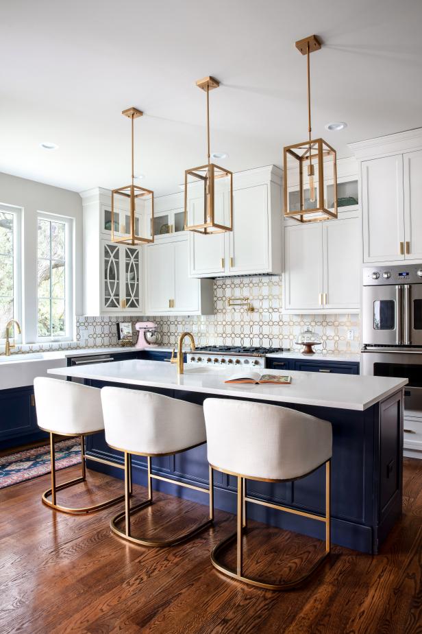 Transitional White Chef Kitchen With Navy Island | HGTV