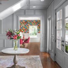 Gray Paneled Foyer and Colorful Dining Room