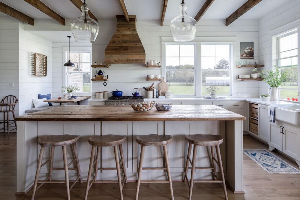 White farmhouse kitchen features wood accents.