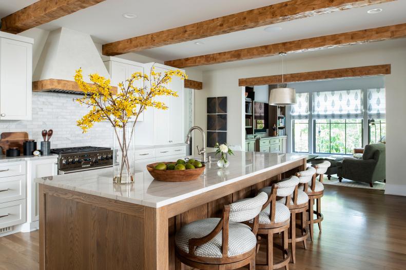 Exposed Beams in Kitchen, Wood Trimmed Hood, Four Seats at Island