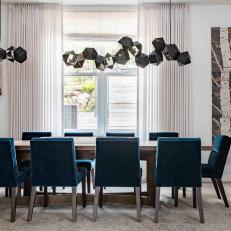 Modern Dining Room With Blue Chairs