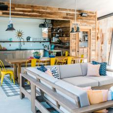 Open Living Space Features Rustic Wood Paneling