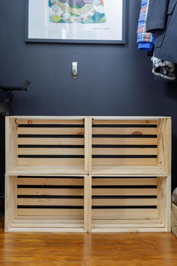 Shelfs placed at the bottom of a closet. 