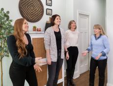 Mina and Karen, hosts of HGTV’s Good Bones, reveal the completed house to Claire & Kate (center).