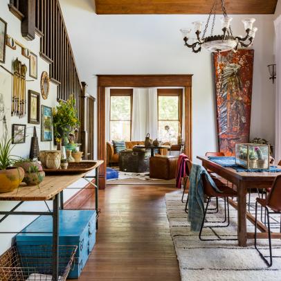 Vibrant Living Space With a Dining Table and Eclectic Decor