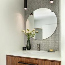 Silver Contemporary Powder Room With White Flowers