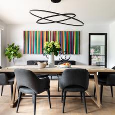 Modern Dining Room With Striped Art