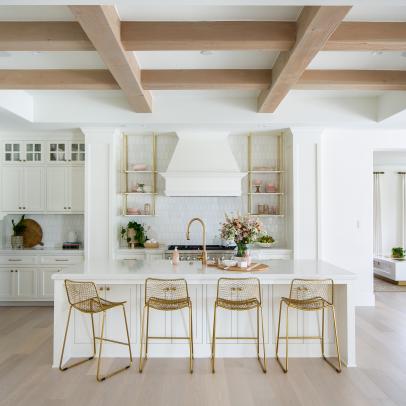 White Transitional Open Plan Kitchen With Brass Stools