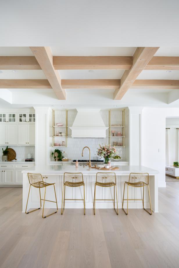 White Transitional Open Plan Kitchen With Brass Stools 