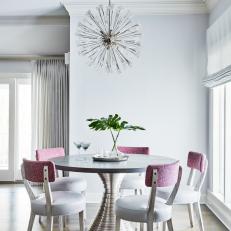 Art Deco Dining Room With Pink Chairs