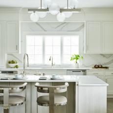 White Chef Kitchen With Curved Back Barstools