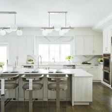 White Transitional Chef Kitchen With White Flowers