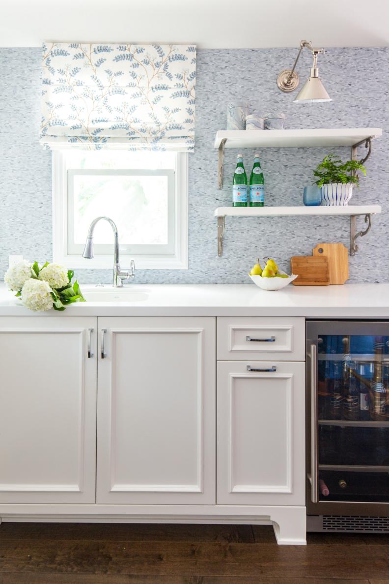 Bar Area With Wine Fridge in Blue and White Kitchen