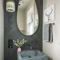 Neutral Contemporary Powder Room With Herringbone Tile and Floating Sink 
