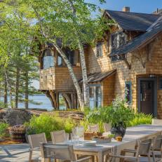 Lakefront Cabin With Cedar Shingles and Outdoor Dining Table 