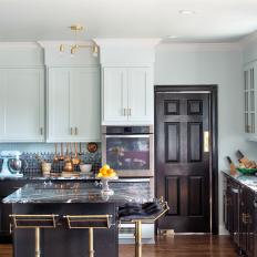 Contemporary Two Toned Kitchen With Wood Door