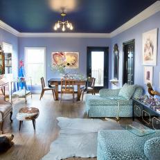 Blue Eclectic Sitting Room With Leopard Chaises