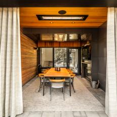 Gray Urban Dining Room With Paneling