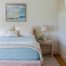 Coastal Neutral Bedroom With Yellow Flowers