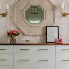 White Dresser and Pink Marbled Wallpaper