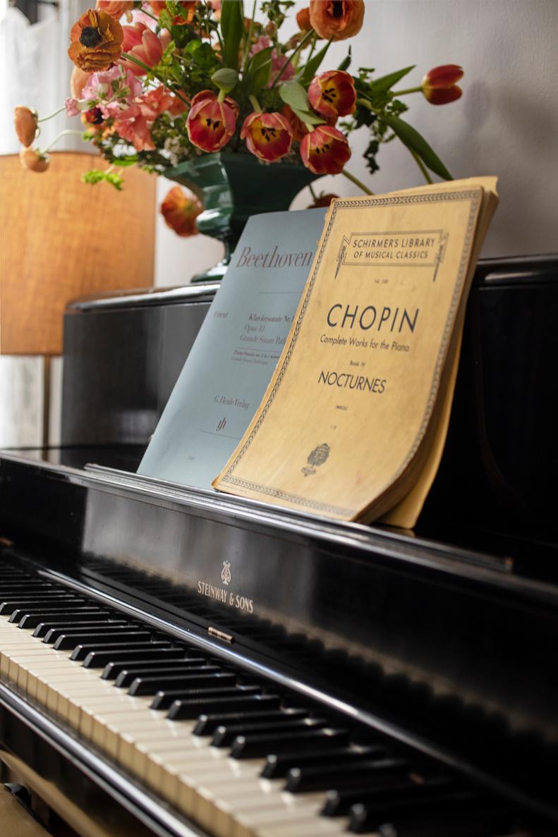 A Fresh Flower Arrangement on Top of a Steinway Piano