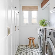 White Laundry Room With Extra Storage