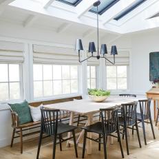 Contemporary Dining Room With Skylights