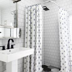 White Coastal Bathroom With Anchor Curtain