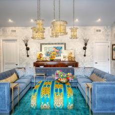 Eclectic Living Room With Blue U-Shaped Sofa