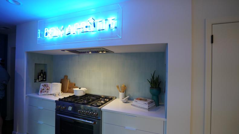 Homeowners Nico and Erika Sprotti's renovated kitchen, complete with a neon Bon Appetit sign for added color and to pay homage to Nico's homeland, as seen on Breaking Bland, Season 1.