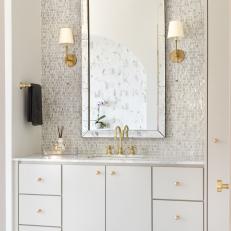 Single Vanity Bathroom With Marble Accents