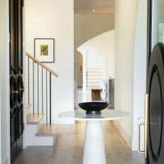Modern Foyer With Natural Wood Flooring