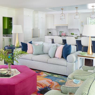 Bold and Beautiful Eclectic Style Living Room With a Pink Upholstered Coffee Table