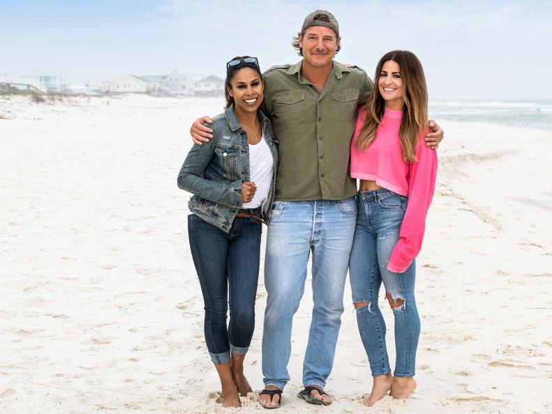 As seen on HGTV's Battle on the Beach, mentors Taniya Nayak, Ty Pennington and Alison Victoria pose on the beach. (Talent)