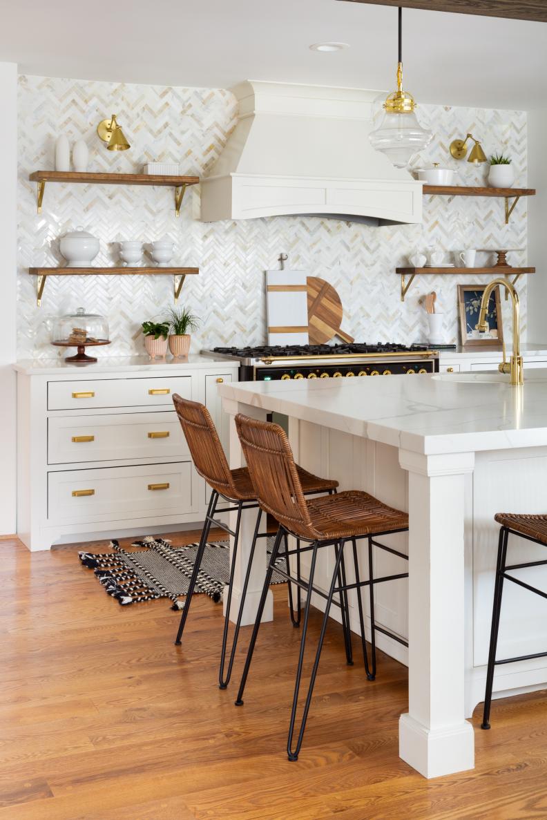 Brass Accents in Traditional Kitchen, Marble Island with Wicker Chairs