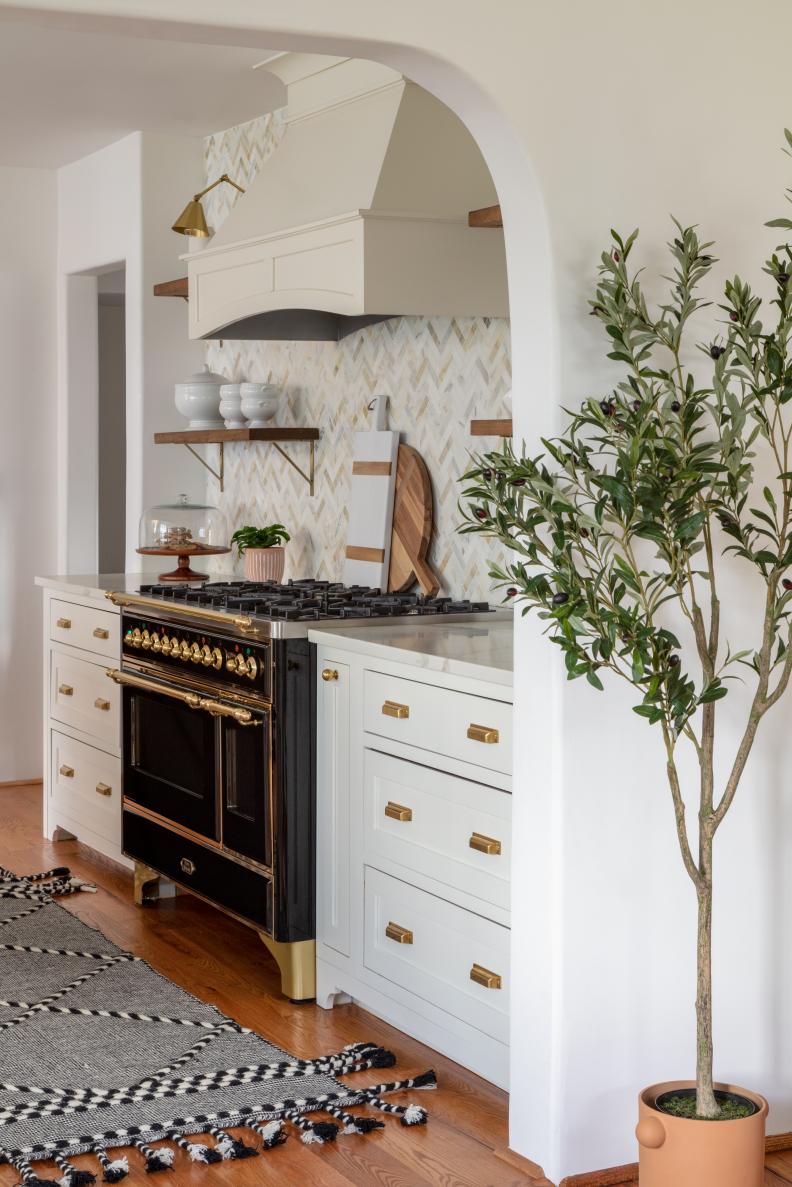 Brass in White Kitchen, Chef's Oven, Herringbone Tile Backsplash