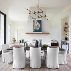 White Contemporary Dining Room With Slipcovered Chairs