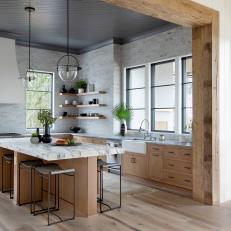 Neutral Contemporary Chef Kitchen With Exposed Beams