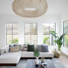 Contemporary Neutral Living Room With Feathered Pendant