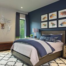 Blue and White Transitional Bedroom With Antlers